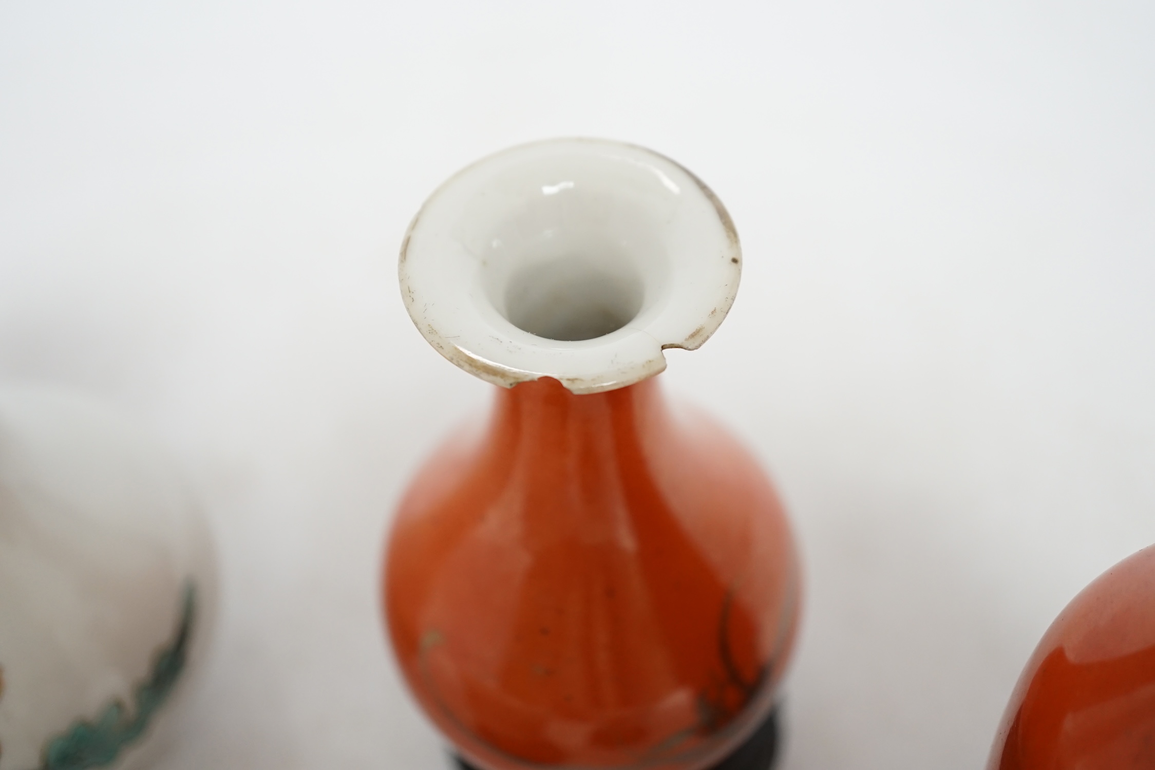 Six Chinese miniature porcelain vases and tea bowls, with wood stands, largest overall 15cm high. Condition - poor to fair